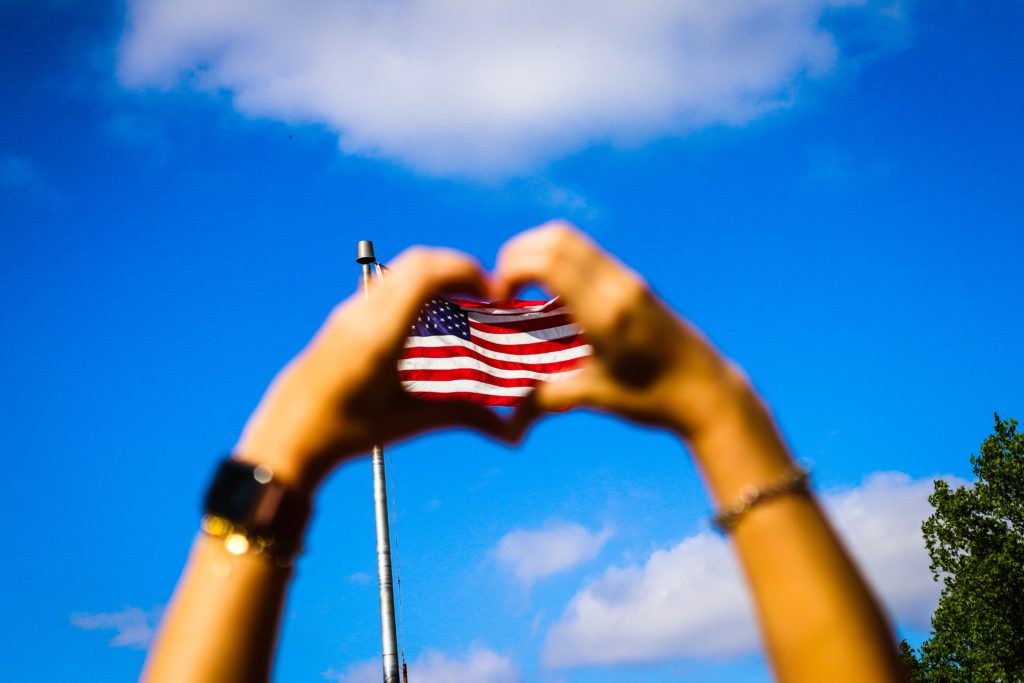 human-hands-and-us-flag-2240293